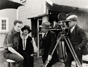 pictured: Thomas Meighan, Estelle Taylor, Herbert Brenon (director) and James Wong Howe (cinematographer) on the set of The Alaskan - Paramount Pictures