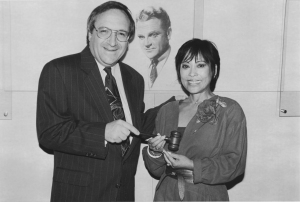 Screen Actors Guild president Barry Gordon passes the gavel to first vice president, Sumi Haru, who becomes acting president.