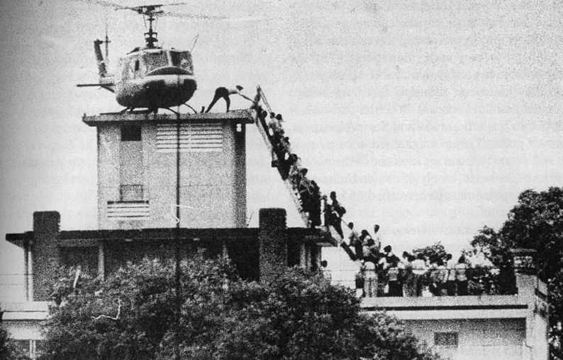 Fall of Saigon2 (helicopter lands on roof of apartment building as people line up to board