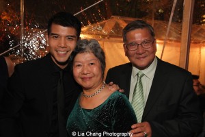 Telly Leung and his parents. Photo by Lia Chang