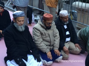 Muslim Americans seen praying near Trump Towers in New York City.